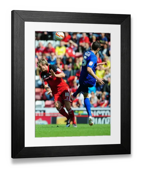 Framed Print : Battling for Supremacy: Woolford vs. Hudson in the Bristol City vs. Cardiff City Championship Clash Framed Print : Battling for Supremacy: Woolford vs. Hudson in the Bristol City vs. Cardiff City Championship Clash