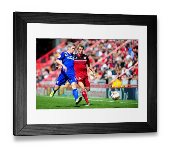 Framed Print : Bristol City vs. Cardiff City: Intense Moment between Woolford and McNaughton in Championship Clash