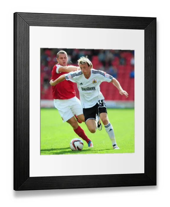 Framed Print : Battling for Supremacy: Woolford vs. Dawson in the Championship Clash between Barnsley and Bristol City Framed Print : Battling for Supremacy: Woolford vs. Dawson in the Championship Clash between Barnsley and Bristol City