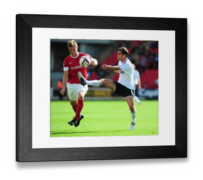 Framed Print : Battling for Supremacy: Sam Baldock vs. Scott Wiseman in Championship Clash