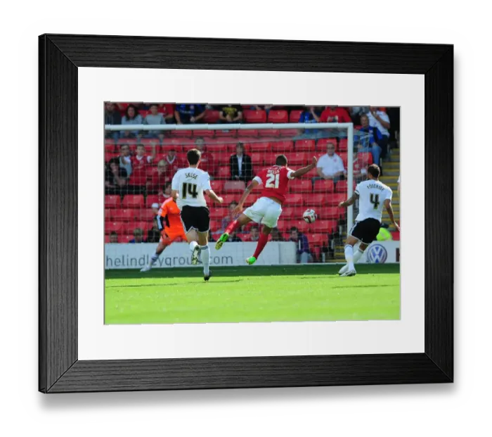 Framed Print : Barnsley's Jacob Mellis Narrowly Misses from Distance in Barnsley v Bristol City Championship Clash