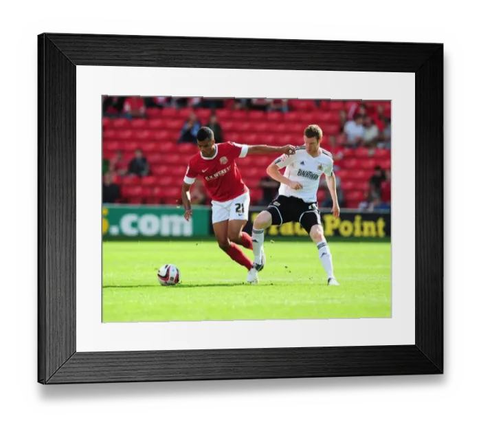 Framed Print : Battling for Supremacy: Pearson vs. Mellis in the Championship Clash between Barnsley and Bristol City Framed Print : Battling for Supremacy: Pearson vs. Mellis in the Championship Clash between Barnsley and Bristol City