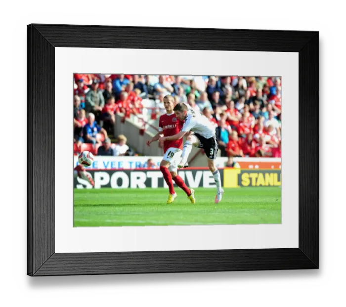 Framed Print : Mark Wilson's Shot Saved: Barnsley vs. Bristol City Football Rivalry in Championship Framed Print : Mark Wilson's Shot Saved: Barnsley vs. Bristol City Football Rivalry in Championship