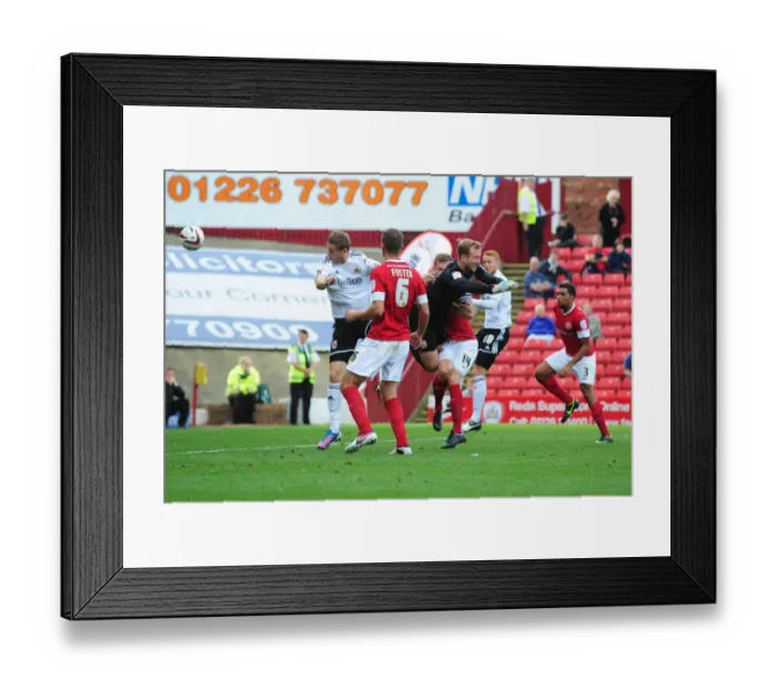 Framed Print : Steven Davies Close Call: A Heading Moment from Barnsley vs. Bristol City Championship Clash Framed Print : Steven Davies Close Call: A Heading Moment from Barnsley vs. Bristol City Championship Clash