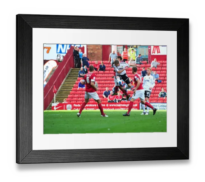 Framed Print : Steven Davies Close Call: A Headed Goal Attempt vs Barnsley (Bristol City in Championship, 01 / 09 / 2012) Framed Print : Steven Davies Close Call: A Headed Goal Attempt vs Barnsley (Bristol City in Championship, 01 / 09 / 2012)