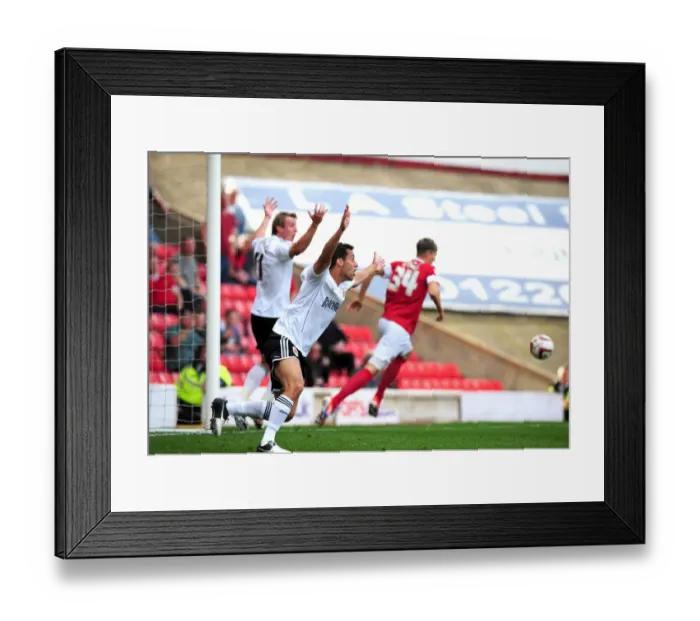 Framed Print : Barnsley's John Stones Controversially Halts Martyn Woolford's Goalbound Effort - Bristol City vs Barnsley, Championship 2012 Framed Print : Barnsley's John Stones Controversially Halts Martyn Woolford's Goalbound Effort - Bristol City vs Barnsley, Championship 2012