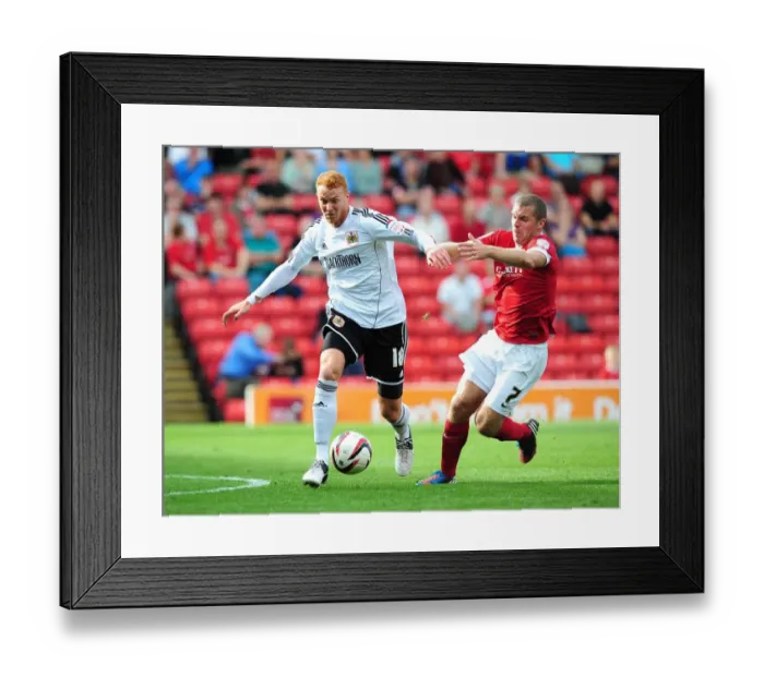 Framed Print : Bristol City's Ryan Taylor vs Barnsley's Stephen Dawson - Championship Clash at Oakwell Stadium, September 1, 2012 Framed Print : Bristol City's Ryan Taylor vs Barnsley's Stephen Dawson - Championship Clash at Oakwell Stadium, September 1, 2012