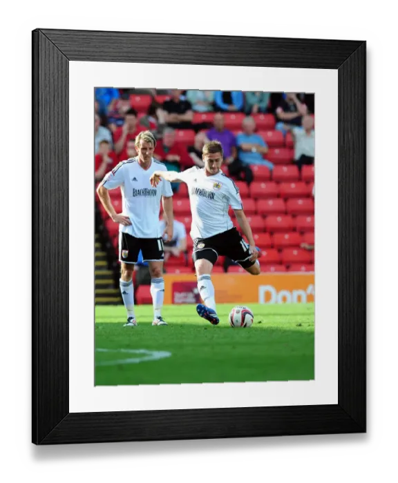 Framed Print : Steven Davies Free Kick Hits the Bar: A Championship Showdown between Barnsley and Bristol City