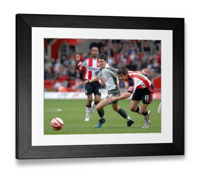 Framed Print : Football Battle: Ivan Sproule Fights for Victory - Southampton vs. Bristol City Framed Print : Football Battle: Ivan Sproule Fights for Victory - Southampton vs. Bristol City