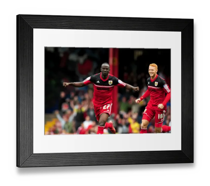 Framed Print : Jubilant Moment: Albert Adomah and Ryan Taylor Celebrate Thrilling Goal for Bristol City in Championship Clash against Blackburn Rovers (September 2012)