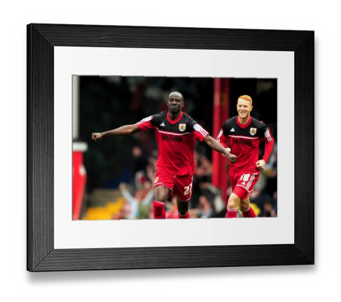 Framed Print : Adomah and Taylor in Glory: Thrilling Moment of Bristol City's Championship Victory Framed Print : Adomah and Taylor in Glory: Thrilling Moment of Bristol City's Championship Victory