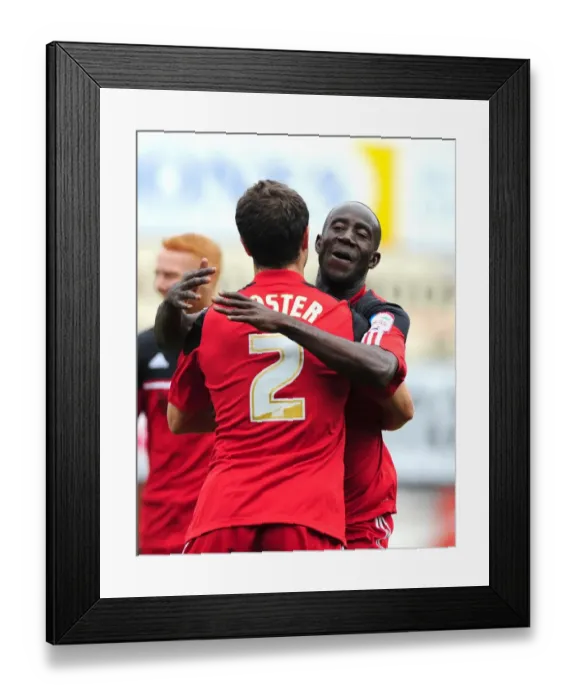 Framed Print : Adomah and Foster Celebrate Goal: Bristol City vs. Blackburn Rovers, Championship Football Match, Ashton Gate Stadium, 2012 Framed Print : Adomah and Foster Celebrate Goal: Bristol City vs. Blackburn Rovers, Championship Football Match, Ashton Gate Stadium, 2012