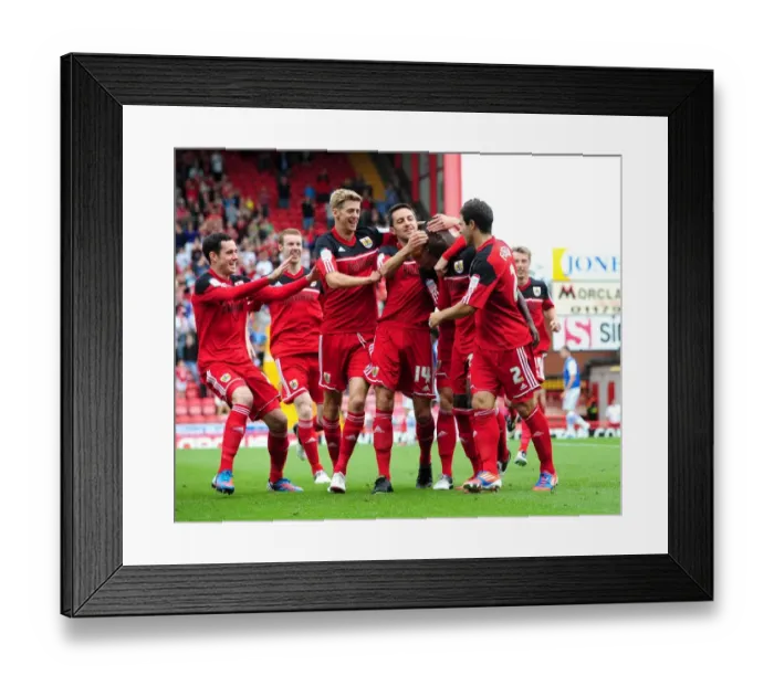 Framed Print : Bristol City Celebrates Championship Win: Albert Adomah and Team Mates Rejoice After Goal Against Blackburn Rovers