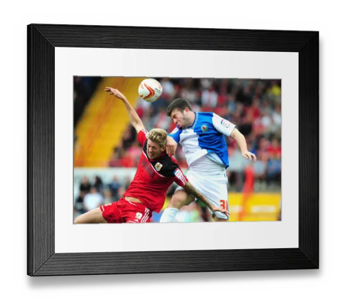 Framed Print : Bristol City vs Blackburn Rovers: Intense Aerial Battle Between Jon Stead and Grant Hanley Framed Print : Bristol City vs Blackburn Rovers: Intense Aerial Battle Between Jon Stead and Grant Hanley