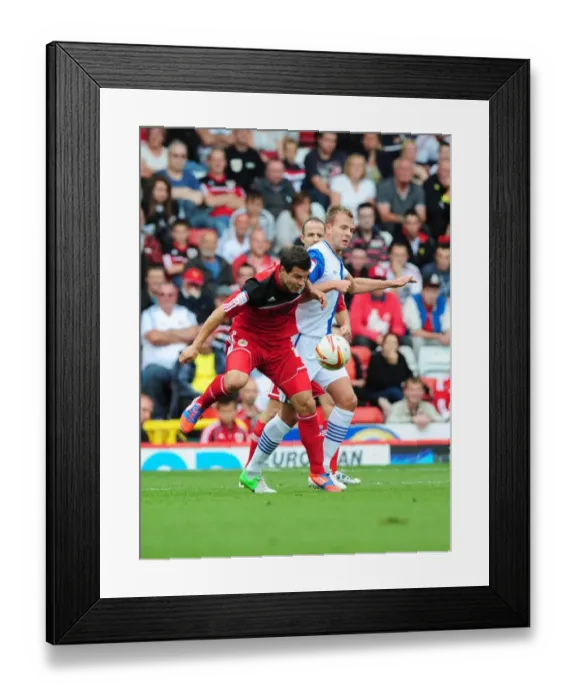 Framed Print : Battling for Supremacy: Foster vs. Rhodes in the Championship Clash between Bristol City and Blackburn Rovers Framed Print : Battling for Supremacy: Foster vs. Rhodes in the Championship Clash between Bristol City and Blackburn Rovers