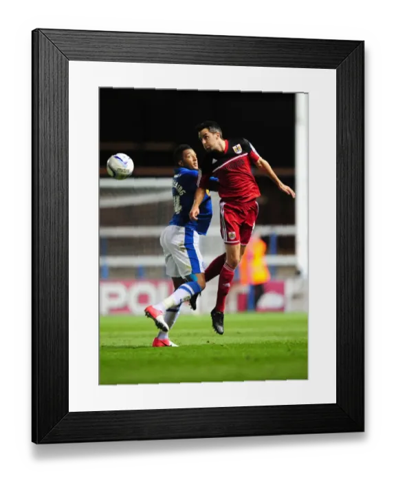 Framed Print : Bristol City's Cole Skuse vs. Peterborough United's Nathaniel Mendez-Laing: A Battle for Supremacy in the Championship Framed Print : Bristol City's Cole Skuse vs. Peterborough United's Nathaniel Mendez-Laing: A Battle for Supremacy in the Championship