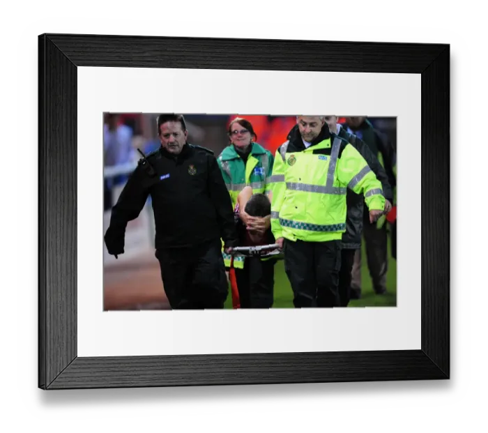 Framed Print : Cole Skuse Injured: Dramatic Moment Bristol City Player Is Stretcher Off During Peterborough United Match