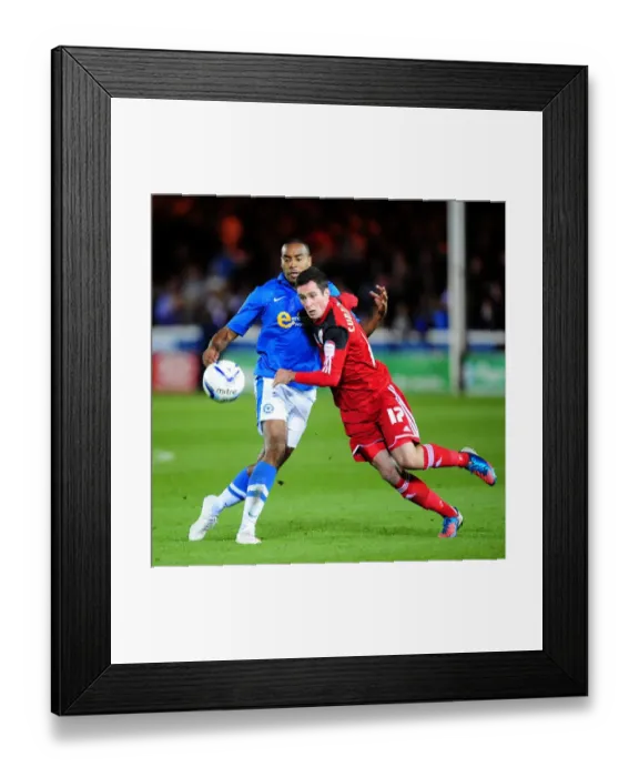 Framed Print : Battling for Supremacy: Cunningham vs Barnett in Peterborough United vs Bristol City Championship Clash Framed Print : Battling for Supremacy: Cunningham vs Barnett in Peterborough United vs Bristol City Championship Clash
