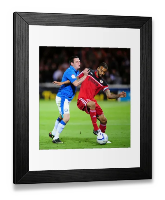 Framed Print : Bristol City's Liam Fontaine Fouled by Lee Tomlin in Peterborough United Match