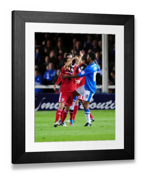 Framed Print : Championship Clash: Temperatures Rise Between Peterborough and Bristol City Players Framed Print : Championship Clash: Temperatures Rise Between Peterborough and Bristol City Players