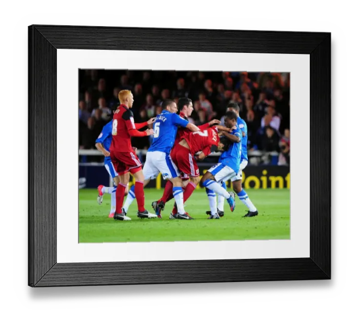 Framed Print : Championship Showdown: Heated Moment Between Peterborough and Bristol City Players