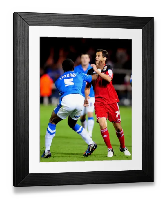 Framed Print : Bristol City's Sam Baldock Throttled by Gabriel Zakuani in Peterborough United Clash