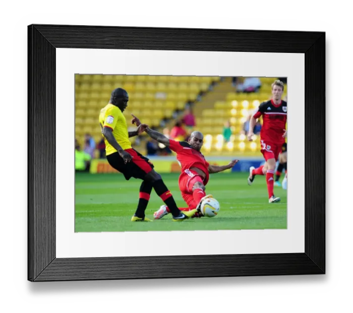 Framed Print : Marvin Elliott Tackles Nyron Nosworthy: Intense Moment in the Championship Clash between Watford and Bristol City