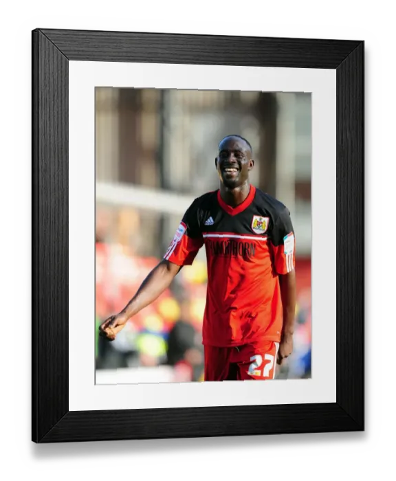 Framed Print : Bristol City's Albert Adomah Embraces Fans in Euphoric Victory Celebrations at Vicarage Road Stadium (Watford vs. Bristol City, Championship Match, 2012)