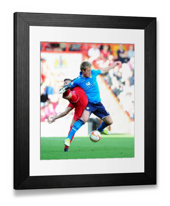 Framed Print : Wilson vs Becchio: A Championship Football Battle at Ashton Gate Framed Print : Wilson vs Becchio: A Championship Football Battle at Ashton Gate