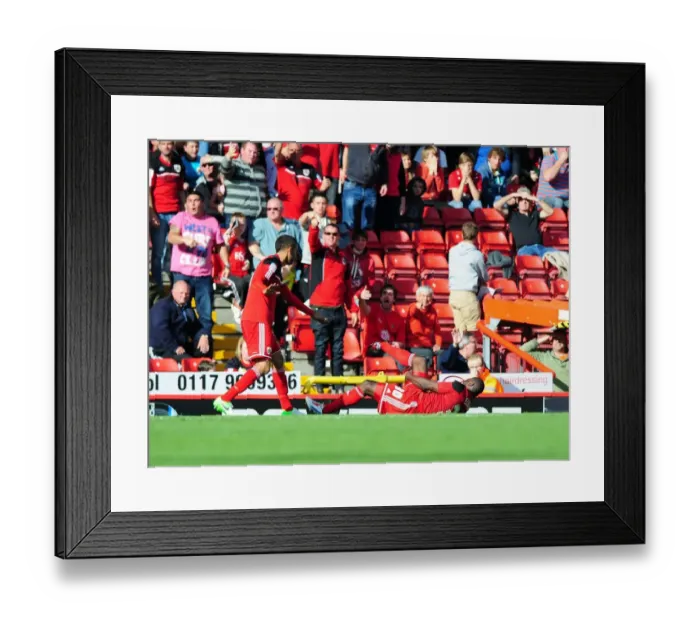 Framed Print : Bristol City's George Elokobi Suffers Horrific Injury: Captain Liam Fontaine and Fans React in Shock