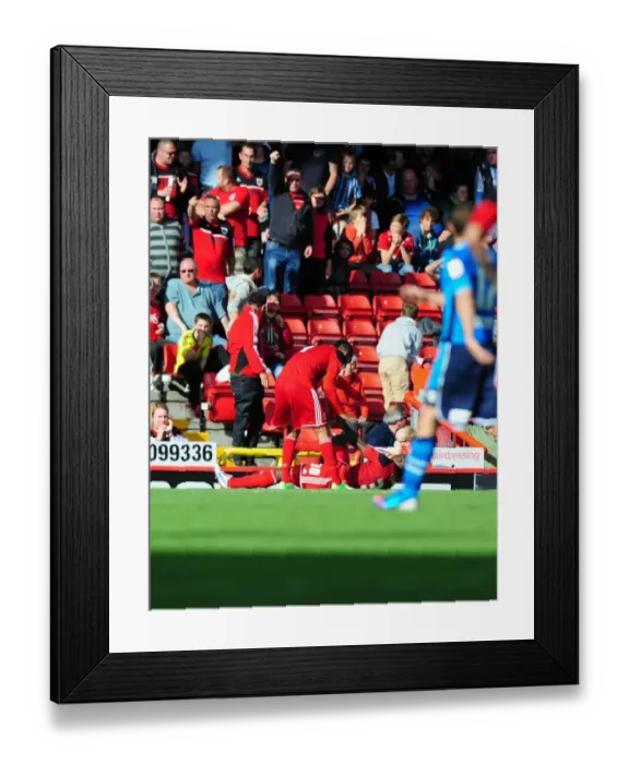 Framed Print : Bristol City: Liam Fontaine and Fans React in Shock as George Elokobi Suffers Horrific Injury during Bristol City v Leeds United Match