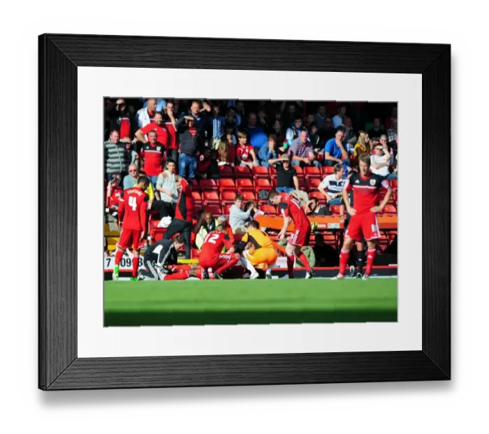 Framed Print : Bristol City: Horror Injury to Debutant George Elokobi vs Leeds United (September 2012) Framed Print : Bristol City: Horror Injury to Debutant George Elokobi vs Leeds United (September 2012)