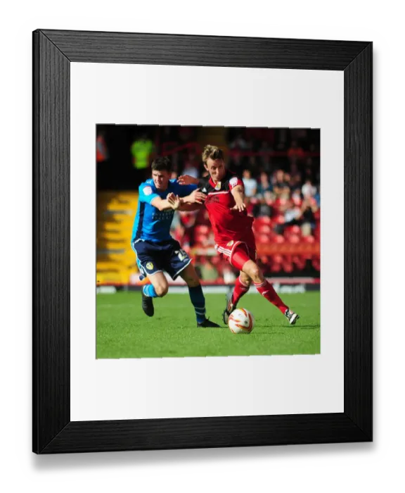Framed Print : Bristol City vs Leeds United: Intense Battle for Possession - Martyn Woolford vs Sam Byram Framed Print : Bristol City vs Leeds United: Intense Battle for Possession - Martyn Woolford vs Sam Byram