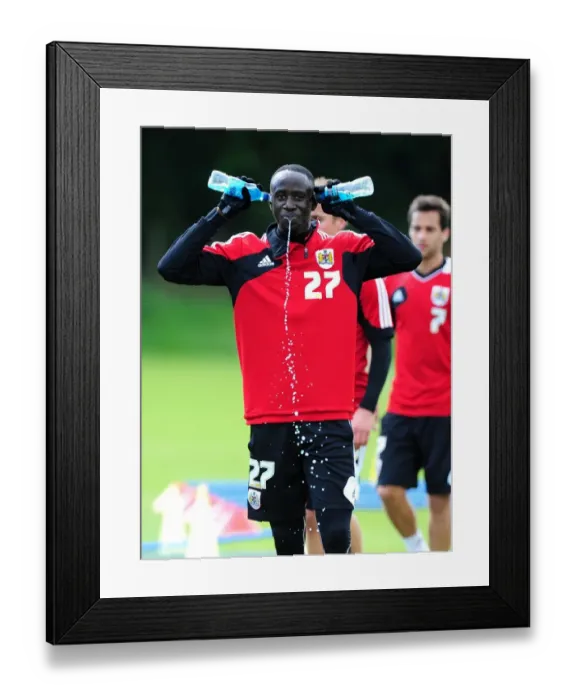 Framed Print : Bristol City Football Club: Albert Adomah Shares a Laugh During Training Framed Print : Bristol City Football Club: Albert Adomah Shares a Laugh During Training