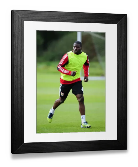 Framed Print : George Elokobi Joins Bristol City for Wolves Loan: Training Session Image