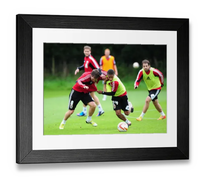 Framed Print : Intense Training: Bobby Reid vs Neil Kilkenny - A Battle for the Ball at Bristol City Football Club