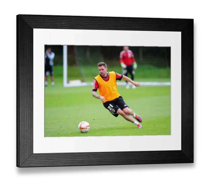 Framed Print : Bristol City Football Club: Paul Anderson in Focus during September 2012 Training