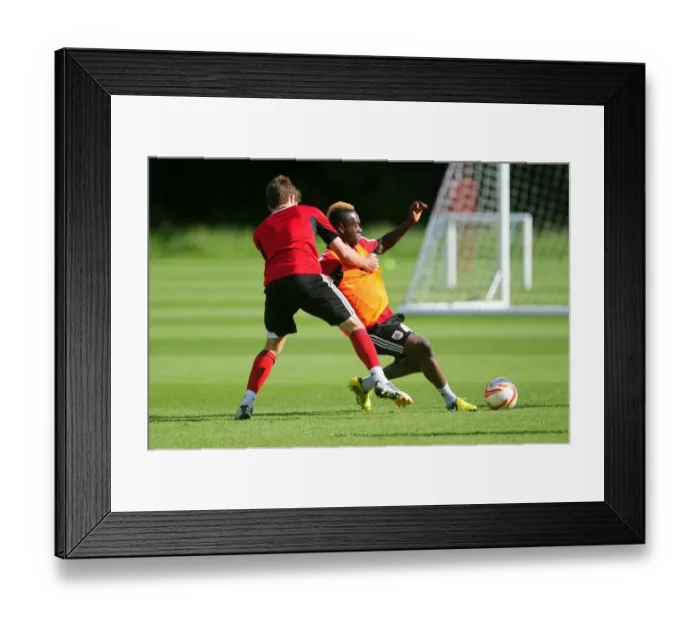 Framed Print : Bristol City Academy Training: Ridwan Oluwatobi Slides for the Ball Framed Print : Bristol City Academy Training: Ridwan Oluwatobi Slides for the Ball