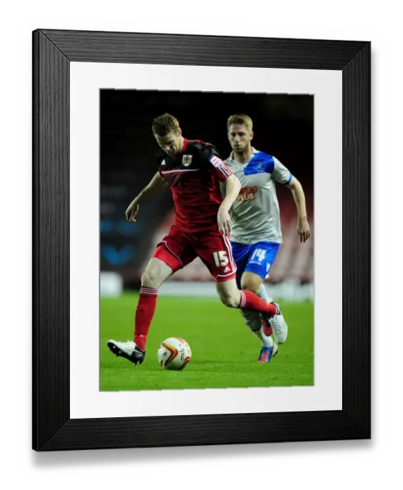 Framed Print : Bristol City's Stephen Pearson vs Millwall's James Henry - Championship Showdown, October 2012