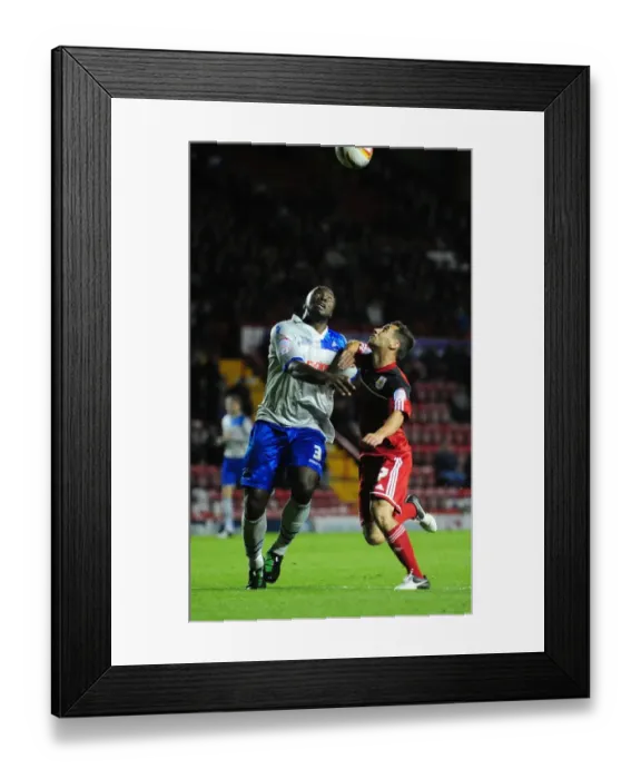 Framed Print : Bristol City vs Millwall: Intense Battle for Possession between Sam Baldock and Danny Shittu Framed Print : Bristol City vs Millwall: Intense Battle for Possession between Sam Baldock and Danny Shittu