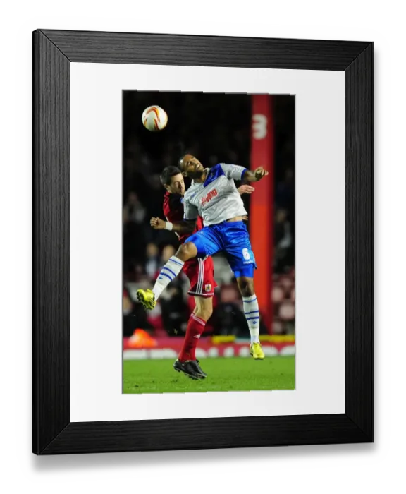 Framed Print : Intense Moment: Cole Skuse vs. Liam Trotter - A Head-to-Head Battle in Bristol City vs. Millwall Championship Match