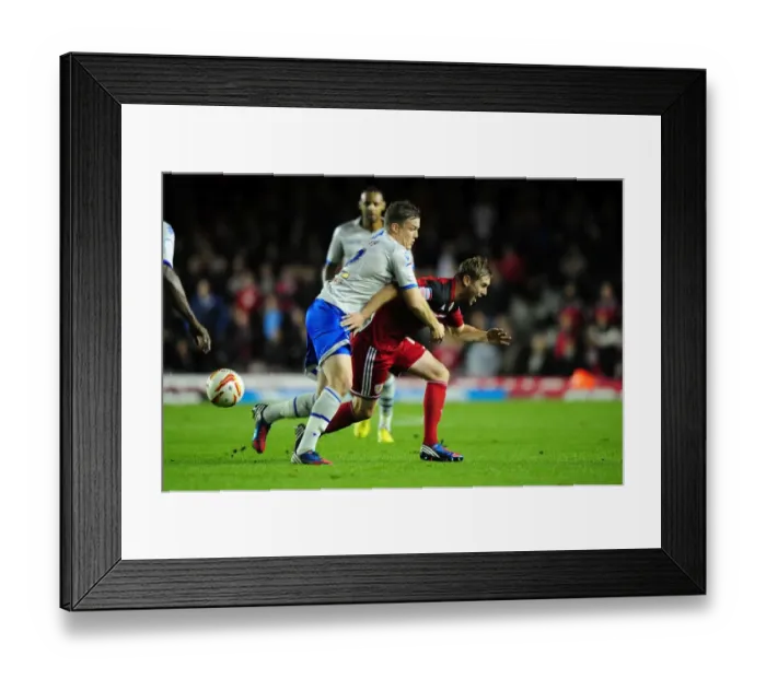 Framed Print : Clash at Ashton Gate: Intense Moment as Shane Lowry of Millwall and Steven Davies of Bristol City Battle for the Ball Framed Print : Clash at Ashton Gate: Intense Moment as Shane Lowry of Millwall and Steven Davies of Bristol City Battle for the Ball