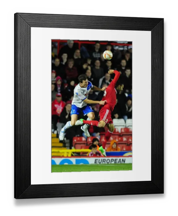 Framed Print : Bristol City vs Millwall: Intense Aerial Battle Between Liam Fontaine and Darius Henderson Framed Print : Bristol City vs Millwall: Intense Aerial Battle Between Liam Fontaine and Darius Henderson