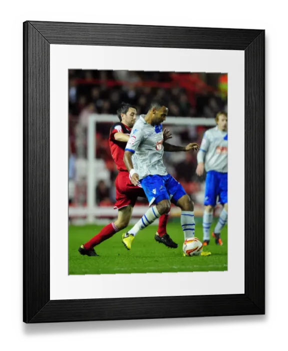 Framed Print : Bristol City vs Millwall: Cole Skuse vs Liam Trotter - Intense Battle for Control