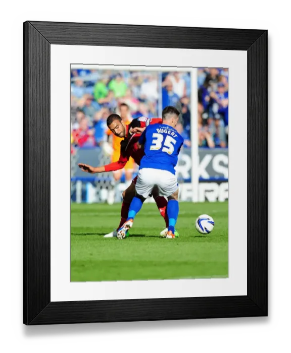 Framed Print : Bristol City vs Leicester City: Liam Fontaine Tackles David Nugent in Championship Clash Framed Print : Bristol City vs Leicester City: Liam Fontaine Tackles David Nugent in Championship Clash