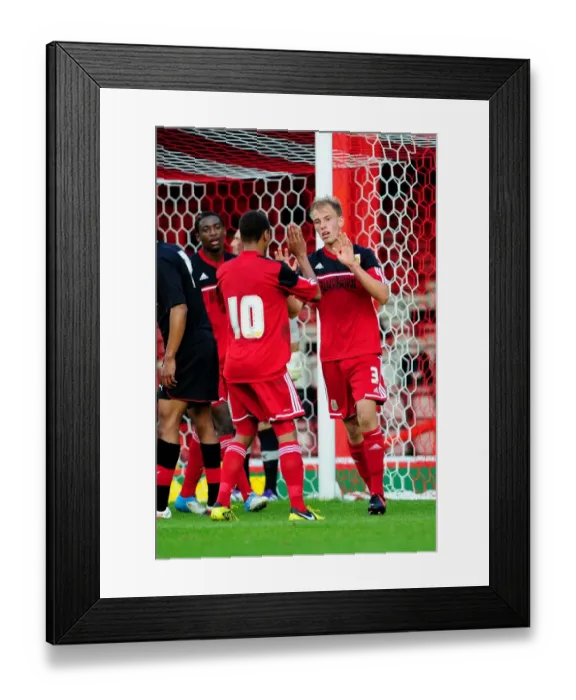 Framed Print : Bristol City U21s Celebrate Win: Bobby Reid Congratulates Tom King Framed Print : Bristol City U21s Celebrate Win: Bobby Reid Congratulates Tom King