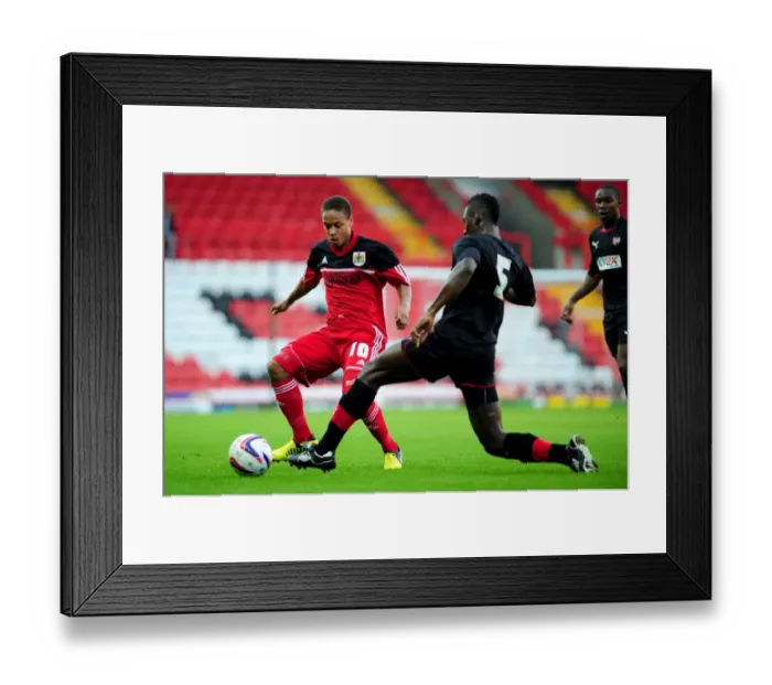 Framed Print : Bobby Reid vs Aaron Pierre: A Battle for Ball Possession - Bristol City U21s vs Brentford U21s Framed Print : Bobby Reid vs Aaron Pierre: A Battle for Ball Possession - Bristol City U21s vs Brentford U21s