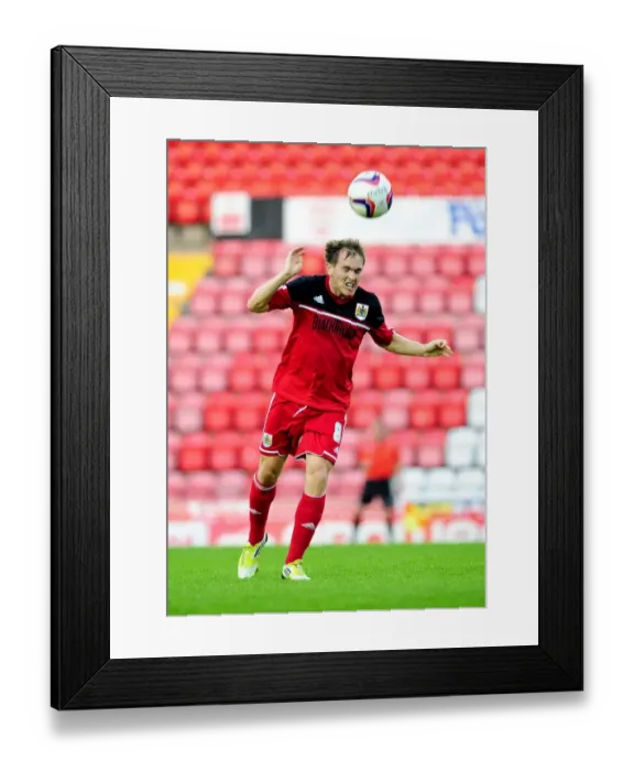 Framed Print : Neil Kilkenny Scores: Thrilling Moment as Bristol City U21s Take on Brentford U21s at Ashton Gate, September 4, 2012 Framed Print : Neil Kilkenny Scores: Thrilling Moment as Bristol City U21s Take on Brentford U21s at Ashton Gate, September 4, 2012