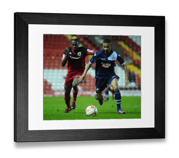 Framed Print : Bristol City vs Millwall: Intense Battle for Control - Football Rivalry in Action Framed Print : Bristol City vs Millwall: Intense Battle for Control - Football Rivalry in Action