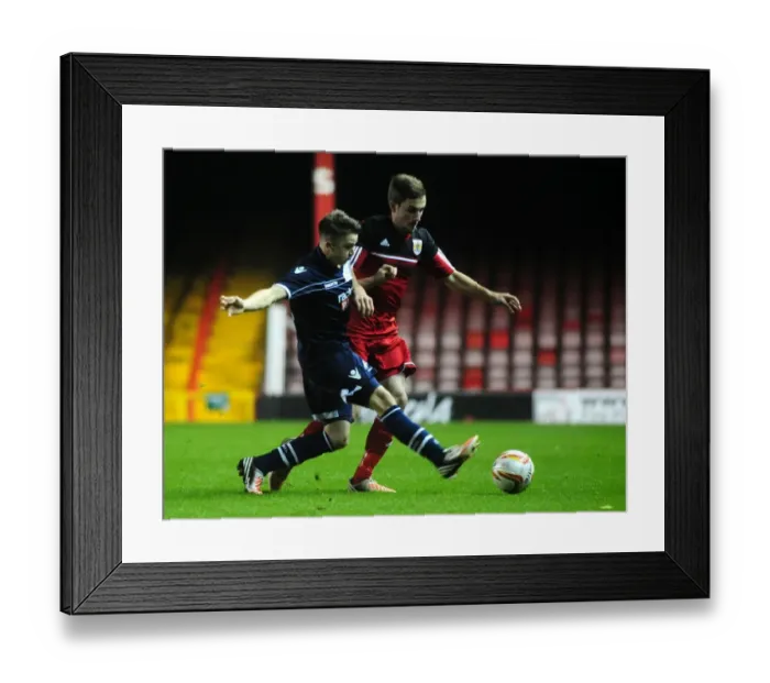 Framed Print : Bristol City vs Millwall: Tense Moment in U21s Football Match at Ashton Gate Framed Print : Bristol City vs Millwall: Tense Moment in U21s Football Match at Ashton Gate